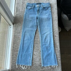 J Brand light cropped jean with a frayed bottom.